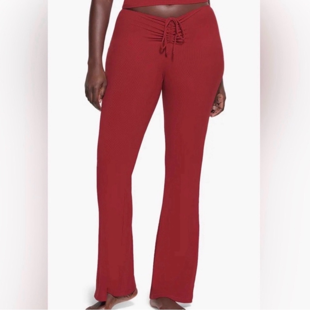 SKIMS Ribbed Drawstring Boot-Cut Pants in Deep Red
